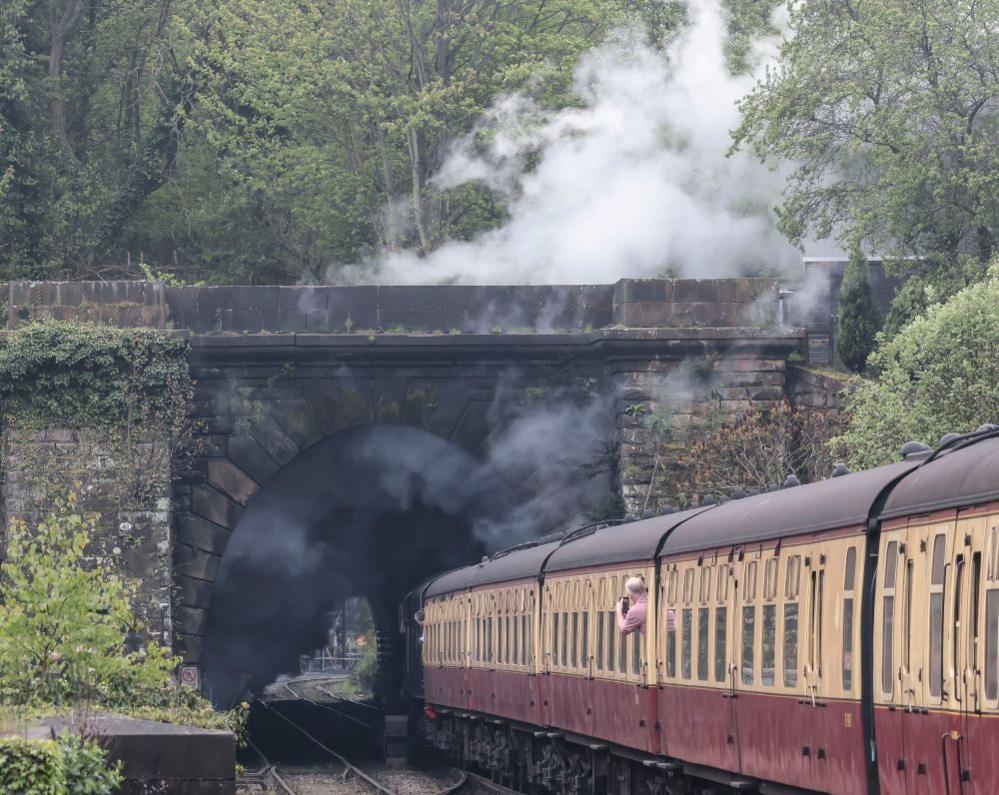 A steam train in a tunnel