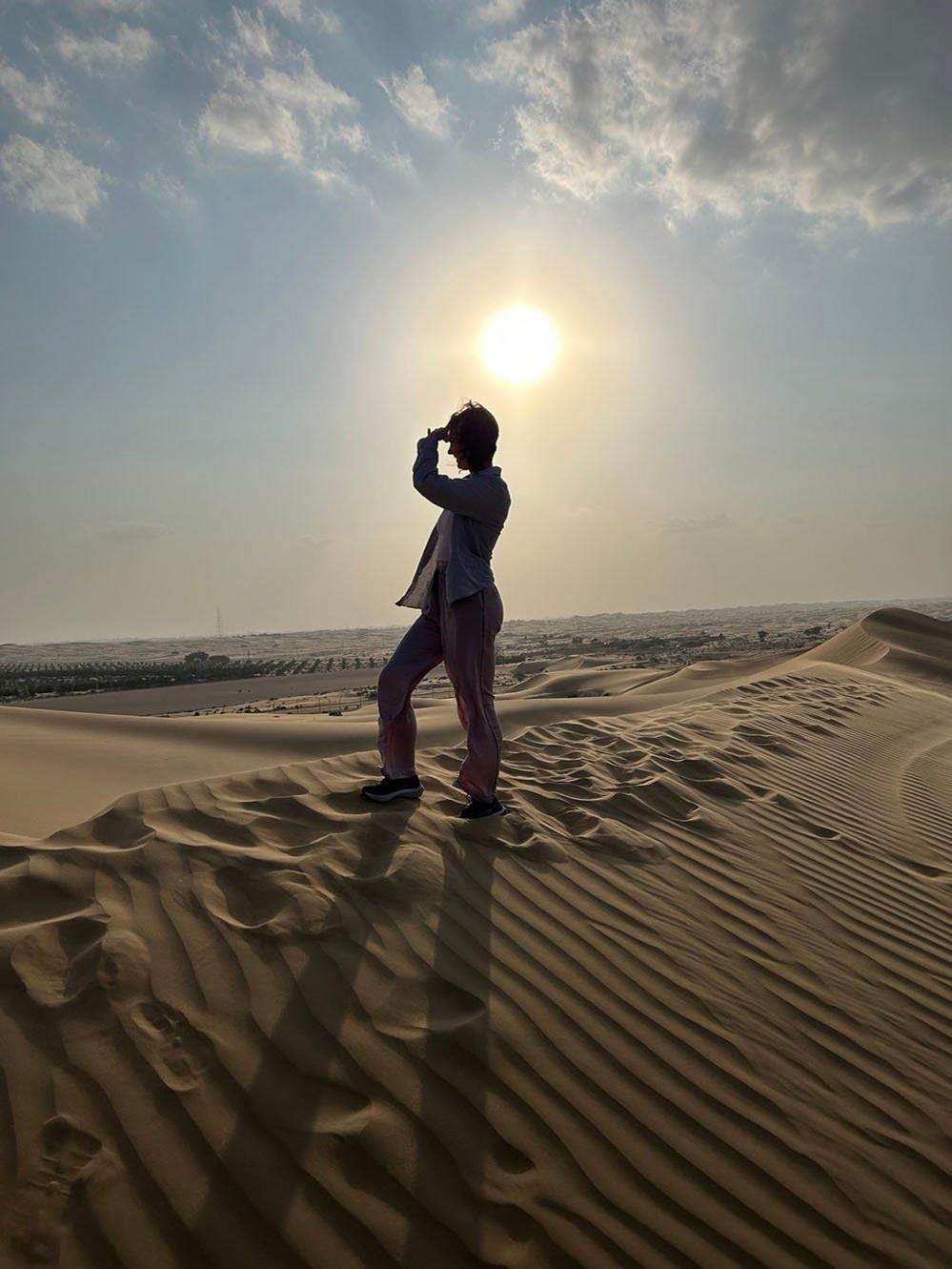 Woman on a sand dune