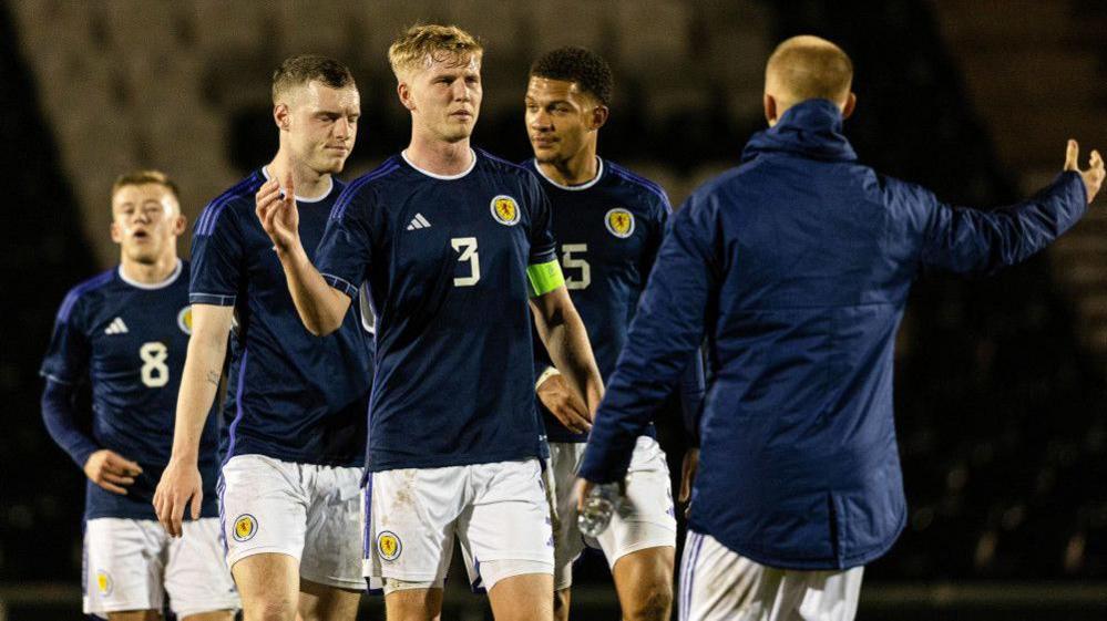 Scotland's Josh Doig and Lewis Fiorini (right) at full time during a UEFA Euro Under-21 Qualifier match between Scotland and Kazakhstan 