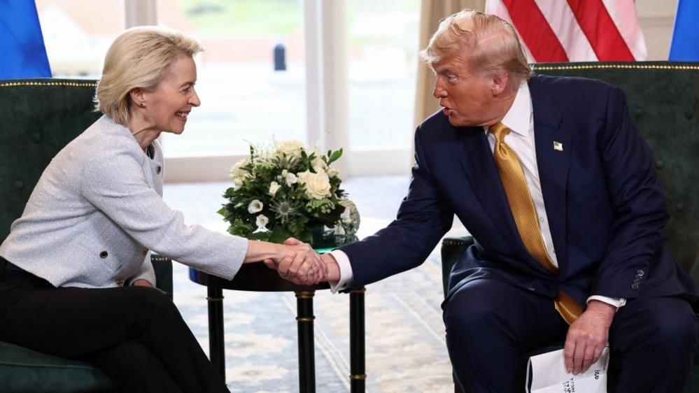 Trump shakes hands with European Commission President Ursula von der Leyen
