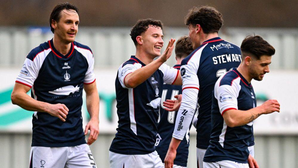 Falkirk's Dylan Tait (C) celebrates scoring to make it 2-0 with teammates Barney Stewart (R) and Liam Henderson during a William Hill Premiership match between Falkirk and Kilmarnock at the Falkirk Stadium,