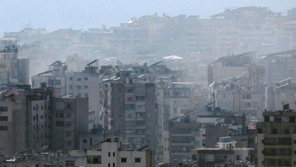 Smoke billows over Beirut's southern suburbs after a strike, amid ongoing hostilities between Hezbollah and Israeli forces, as seen from Sin El Fil, Lebanon, September 29, 2024