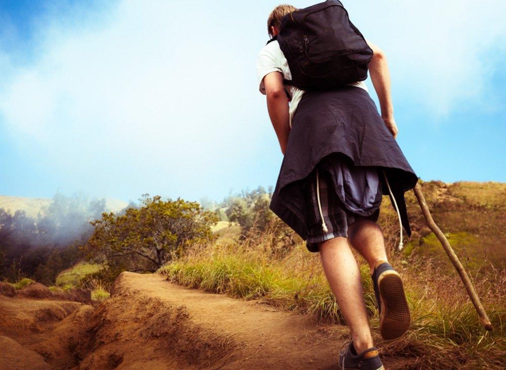 Man walking up Mount Rinjani