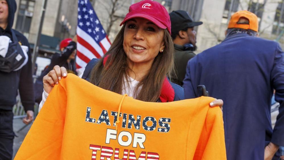 A Trump supporter outside New York Criminal Court where his hush money trial, in New York, New York, USA, 15 April 2024. 