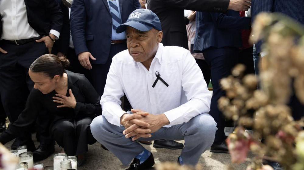 The mayor of New York Eric Adams observes a tribute to the victims of the accident at the Jet Set nightclub, in Santo Domingo, Dominican Republic, 14 April 2025.
