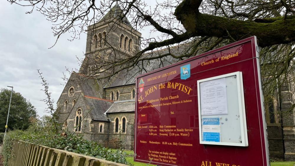 A view of St John the Baptist church from a nearby street.