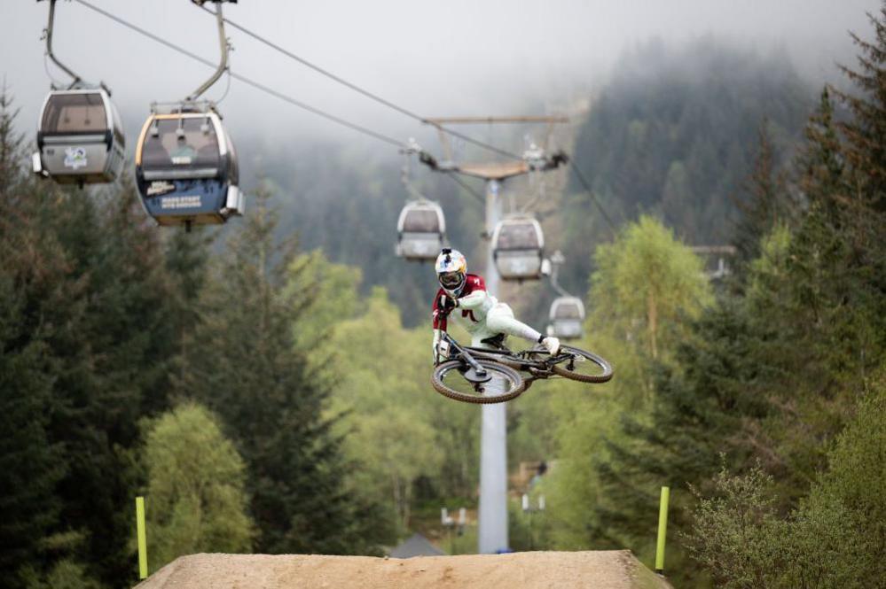 Mountain biker and gondolas