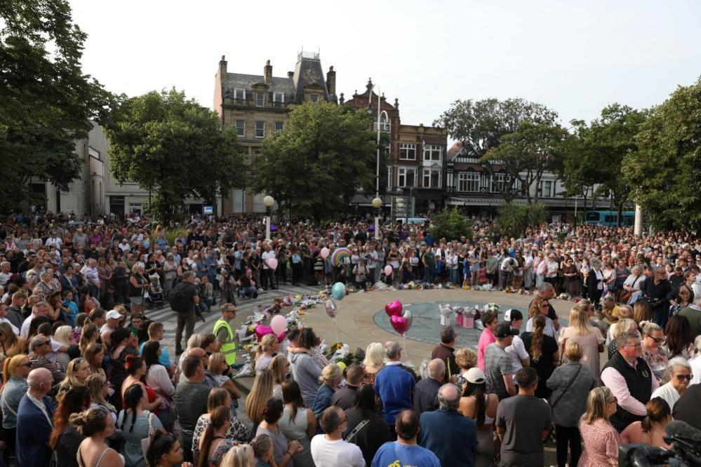 An aerial view of crowds at a vigil after the Southport attack