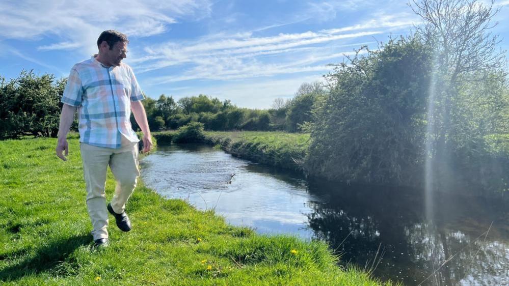 Seamus Sullivan walks along a section of the River Erewash which has become popular for people jumping in.