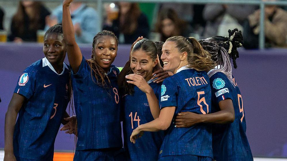 France celebrate their opening goal