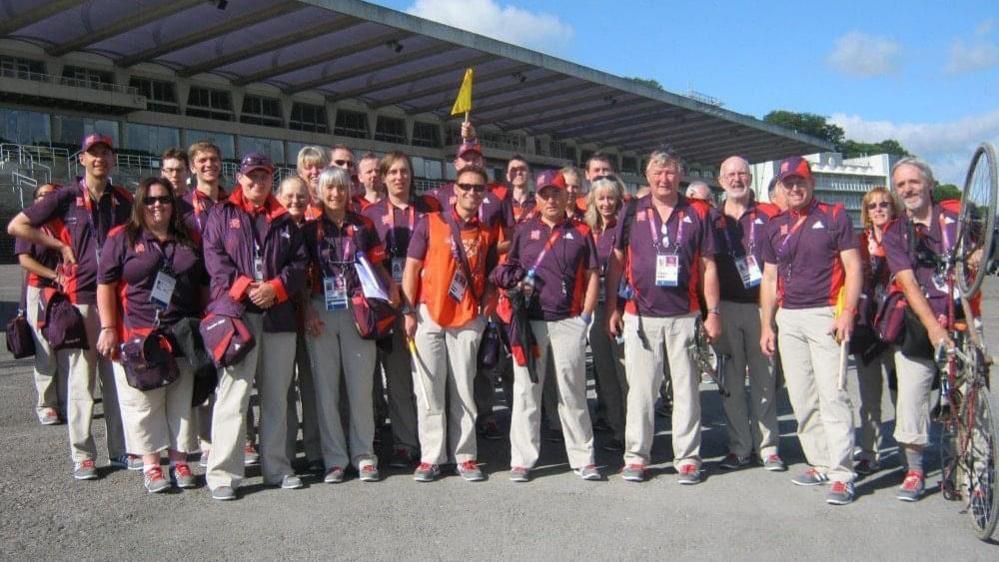 Karolyn Gaston with a group of Games Makers at the 2012 Olympics in London 