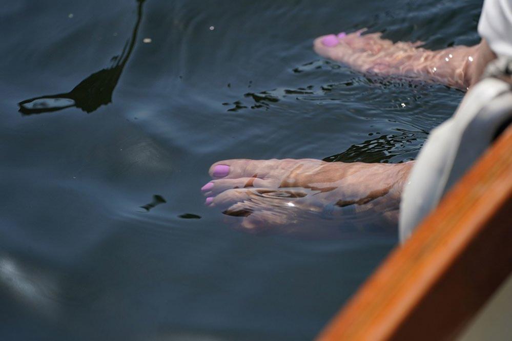 Woman's feet in a river