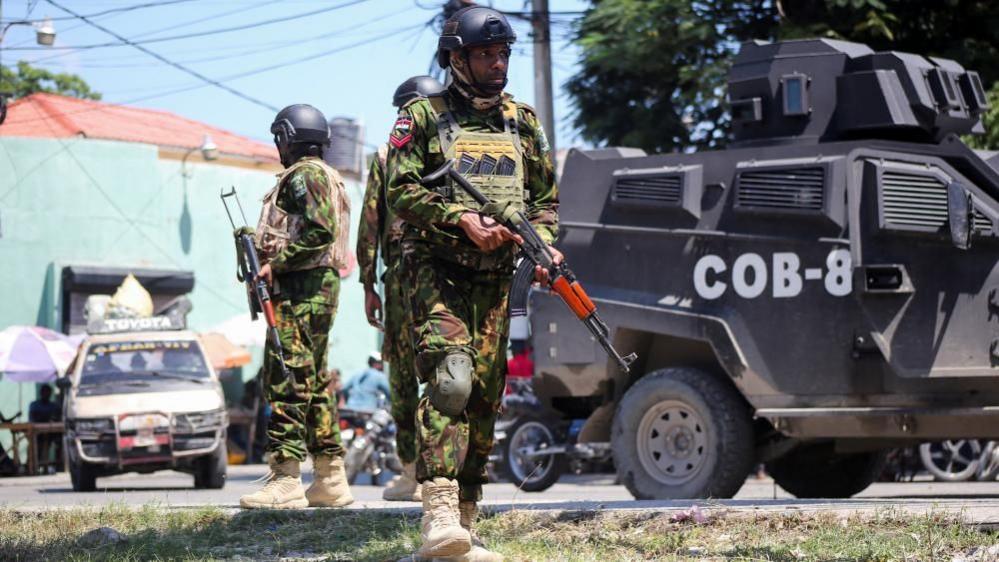 Kenyan police officers patrol in Haiti