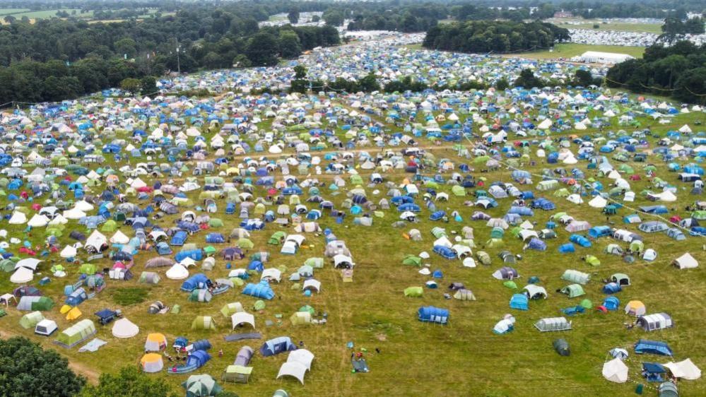 Field filled with tents