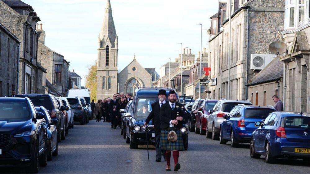 Mourners leaving after the funeral service for former first minister of Scotland Alex Salmond, at Strichen Parish Church in Strichen, Fraserburgh.