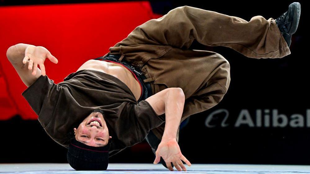 Algeria's Mohamed Chakib in action at the Olympics breakdancing qualifiers