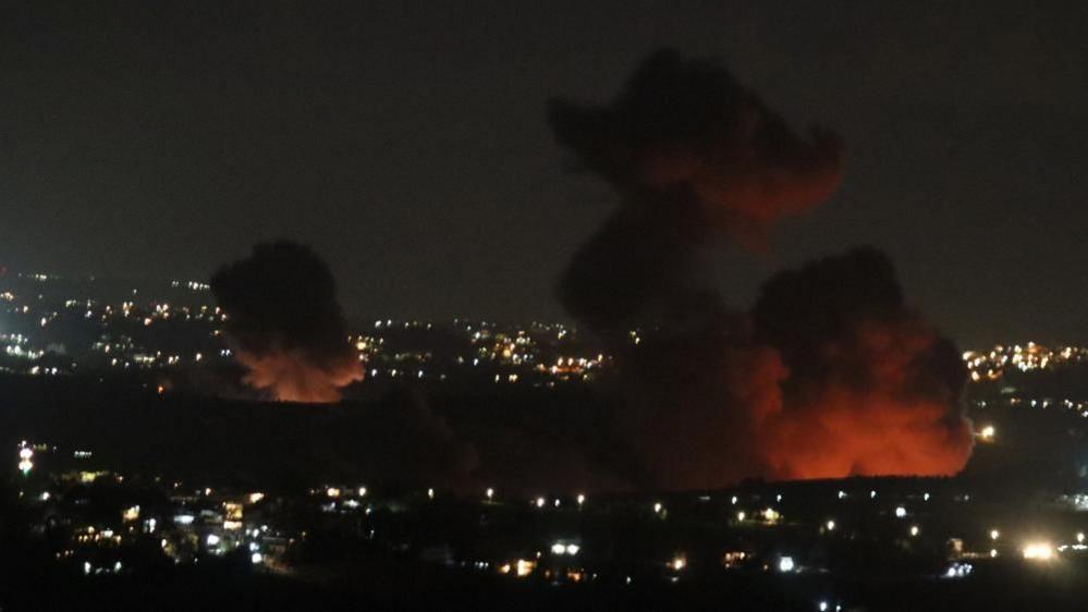 Smoke billows over southern Lebanon following Israeli strikes, amid ongoing cross-border hostilities between Hezbollah and Israeli forces, as pictured from Marjayoun, near the border with Israel, September 21, 2024