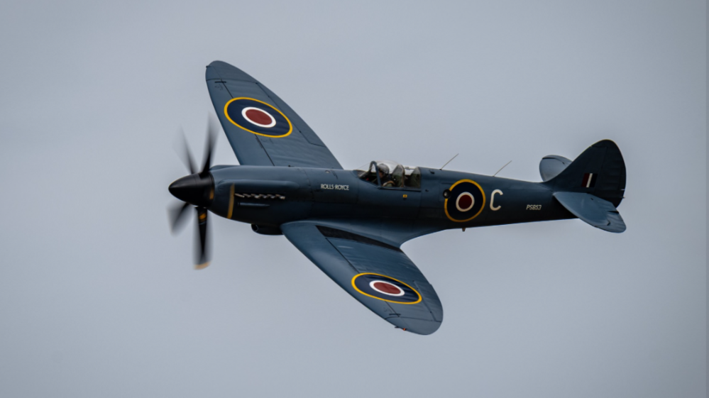 A side-on view of a blue Spitfire