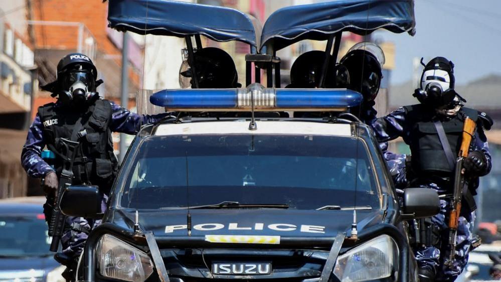 Riot police officers patrol the streets during a rally against what the protesters say are rampant corruption and human rights abuses by the country's rulers in Kampala, Uganda July 23, 2024.