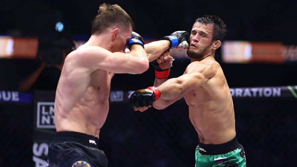 Paul Hughes lands a big shot on Usman Nurmagomedov