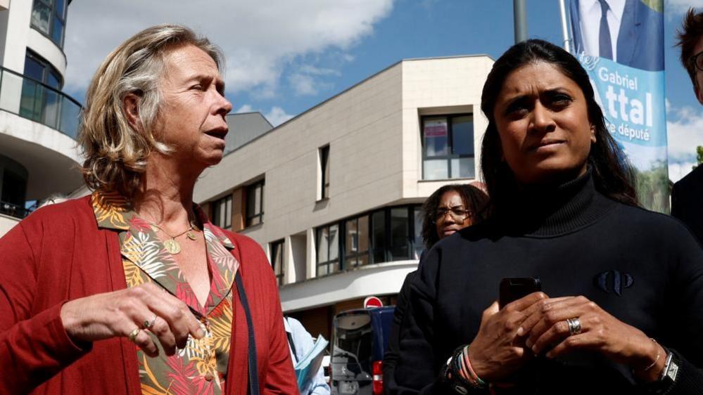 Among those attacked were government spokeswoman Prisca Thevenot (L) and her deputy Virginie Lanlo