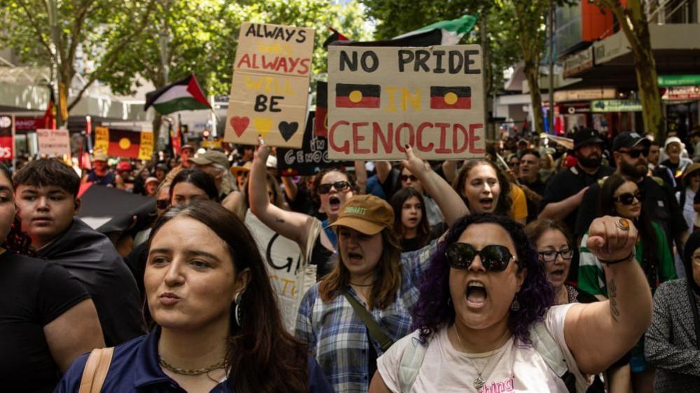 Protestors at rally in Melbourne