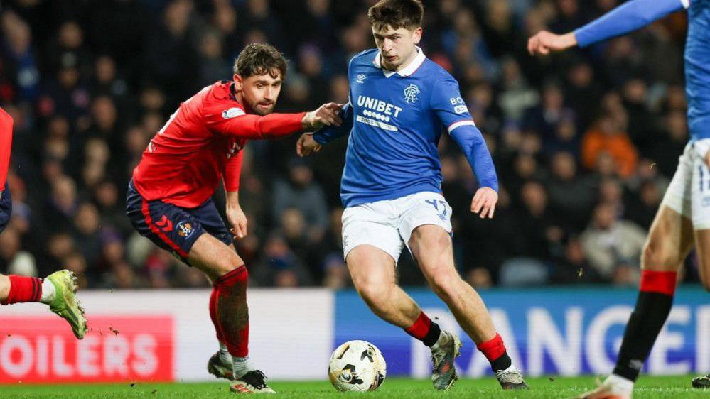 MIkey Moore dribbling against Kilmarnock