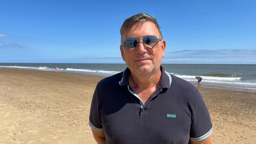 Matt Moore on Southwold beach where he was stung by a weever fish