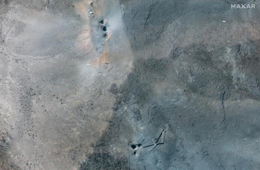 Satellite image shows holes and craters on a ridge at the Fordo nuclear facility in Iran on 22 June.
