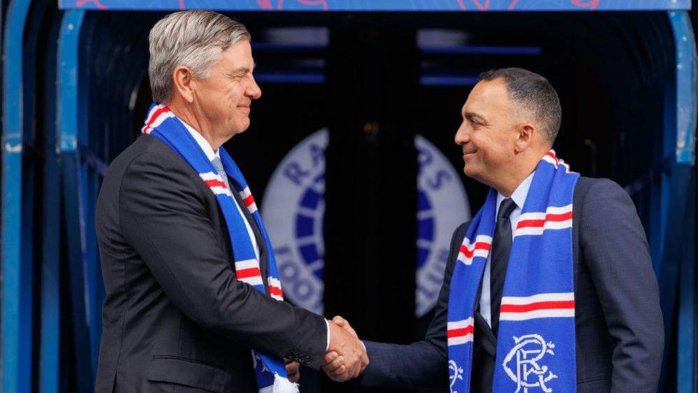 Andrew Cavenagh (L) & Paraag Marathe (R) code  the media aft  their 'Extraordinary General Meeting', connected  June 23, 2025, successful  Glasgow, Scotland.