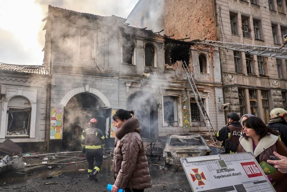 Ukrainian rescuers work at the site of a Russian air strike on a kindergarten in Kharkiv, north-eastern Ukraine. Photo: 22 October 2025