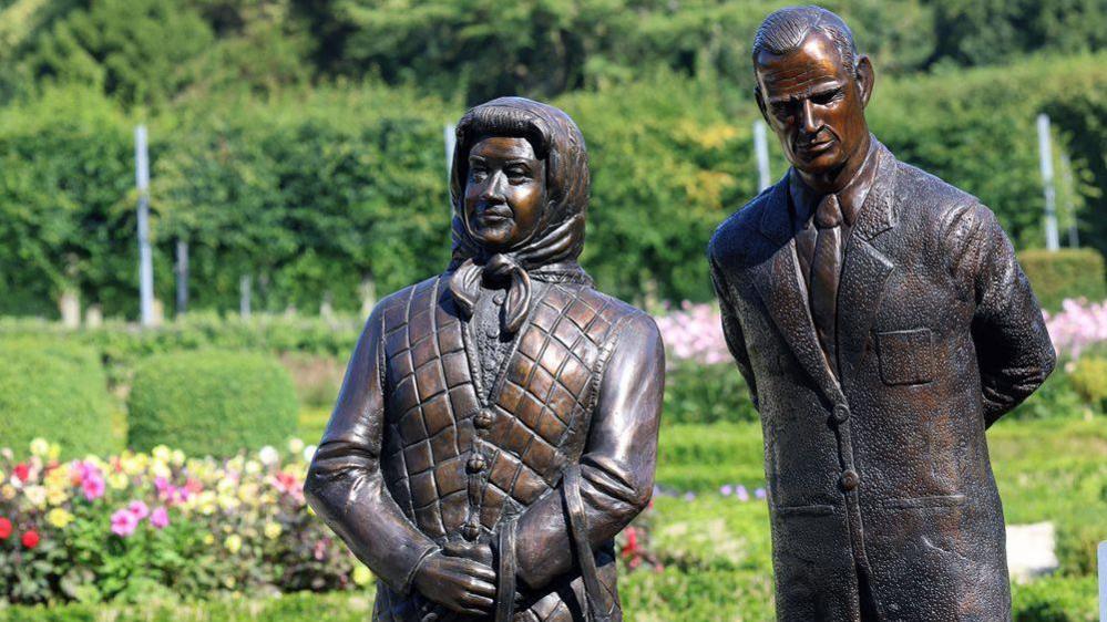 A bronze statue in Antrim Castle Gardens of the late Queen Elizabeth II