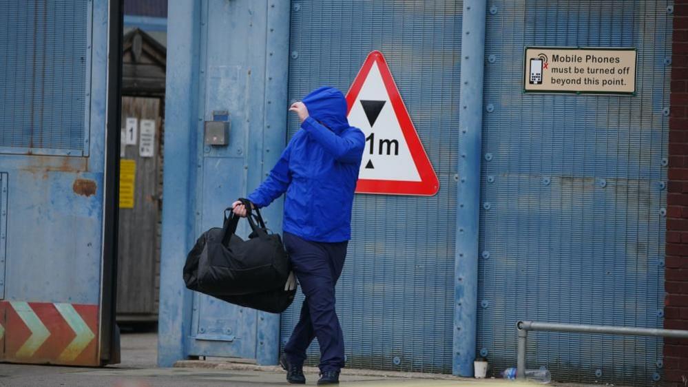 Former inmate leaving through gates of HM Prison Liverpool on 10 September 2024