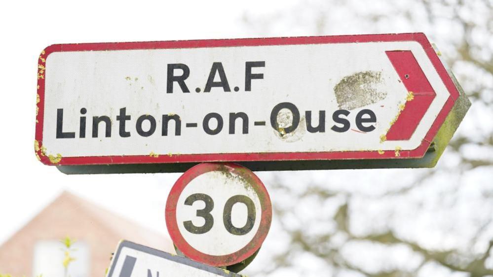 Street sign pointing the way to RAF Linton-on-Ouse