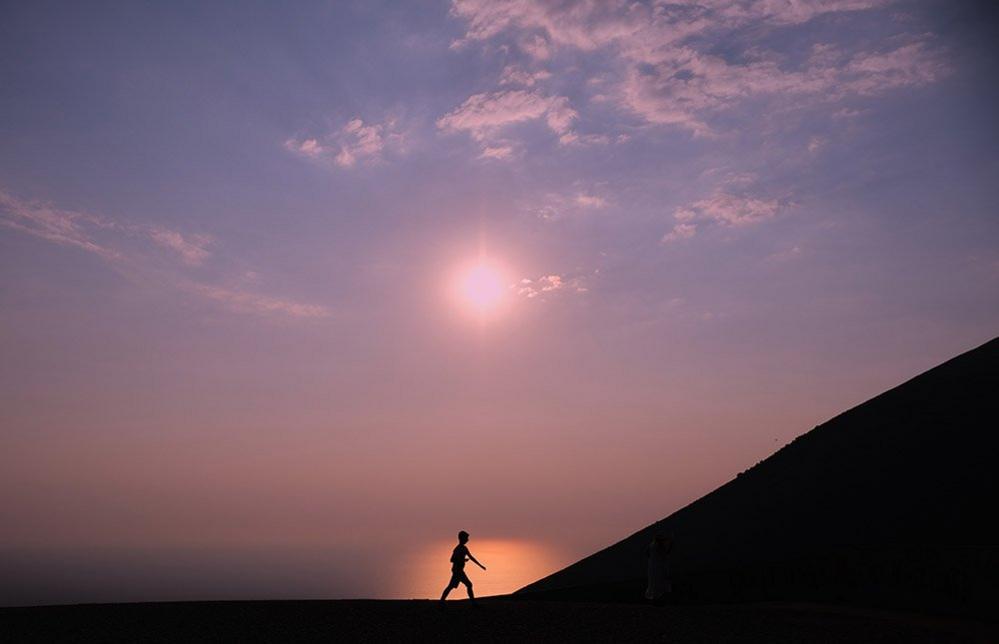 Figure against the horizon