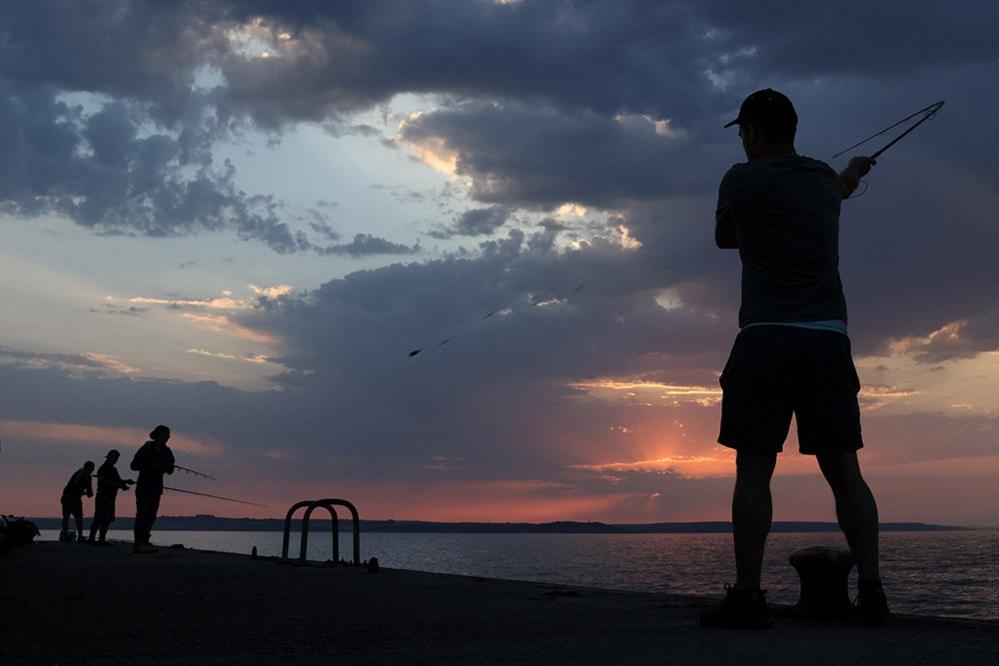 Fishermen in the early morning light