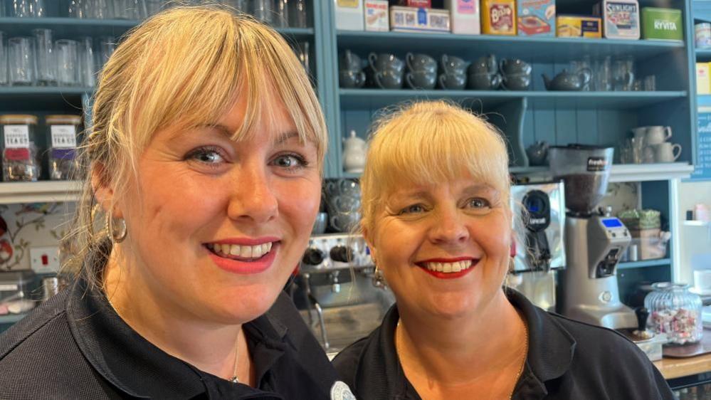 Chloe Cashman and Angie Curtis standing at the counter of the Bridgestones Cafe