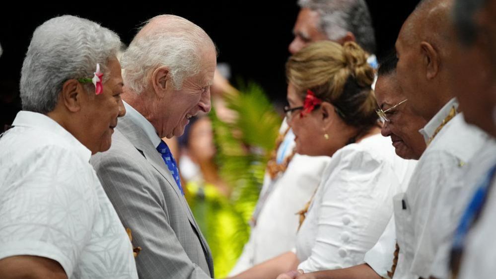 King Charles with Samoa's Prime Minister Fiame Naomi Mata'afa at Faleolo International Airport