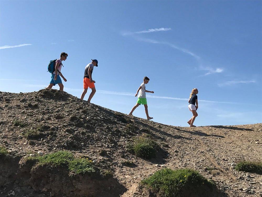 Children on their way to the beach