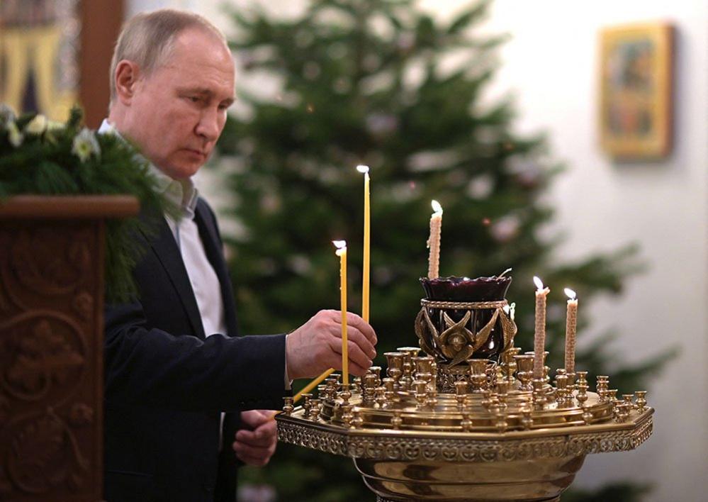 Russian President Vladimir Putin attends the Orthodox Christmas service in Moscow