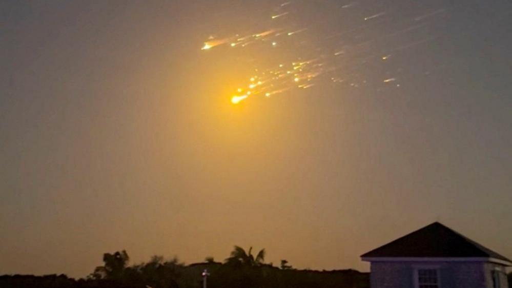 Debris streaking through the dark sky the Bahamas after the rocket exploded last week. 