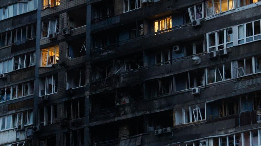 A view of a damaged residential building after a Russian strike in Kyiv, Ukraine. Photo: 10 October 2025