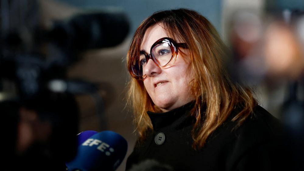 Francesca Satta, lawyer for some of the alleged victims of Le Scouarnec, speaks to media on Monday