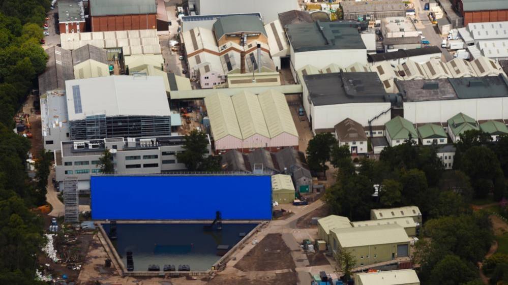 An aerial view of the sound stages and warehouses at Pinewood Studios in Buckinghamshire