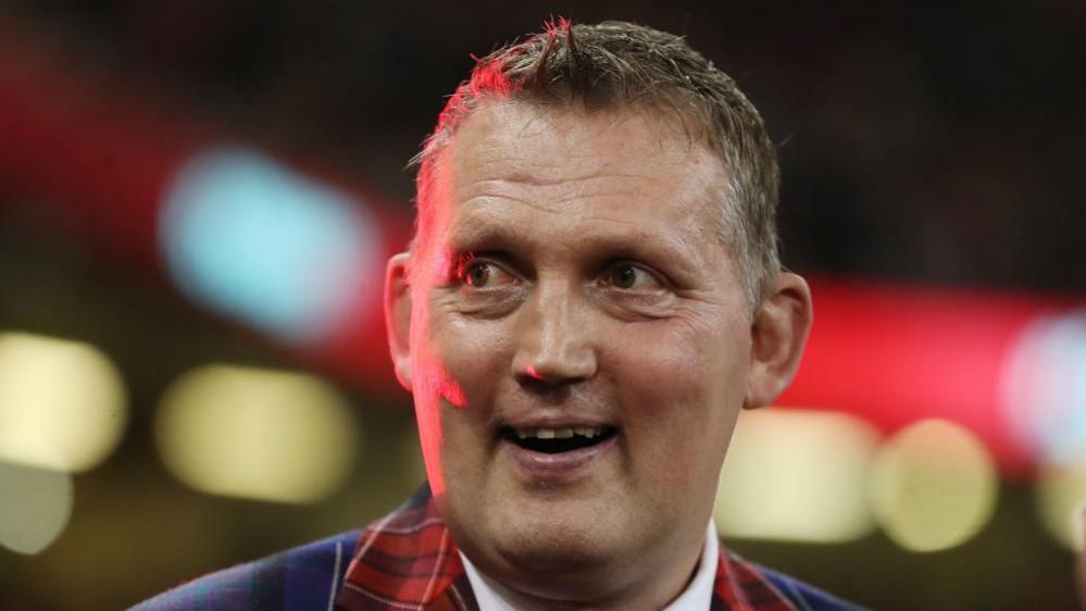 Doddie Weir with short fair hair at a rugby ground