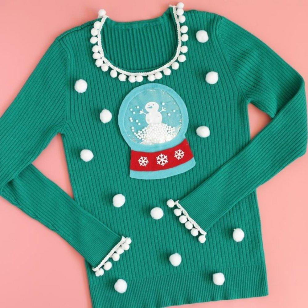 Green jumper with DIY christmas decorations