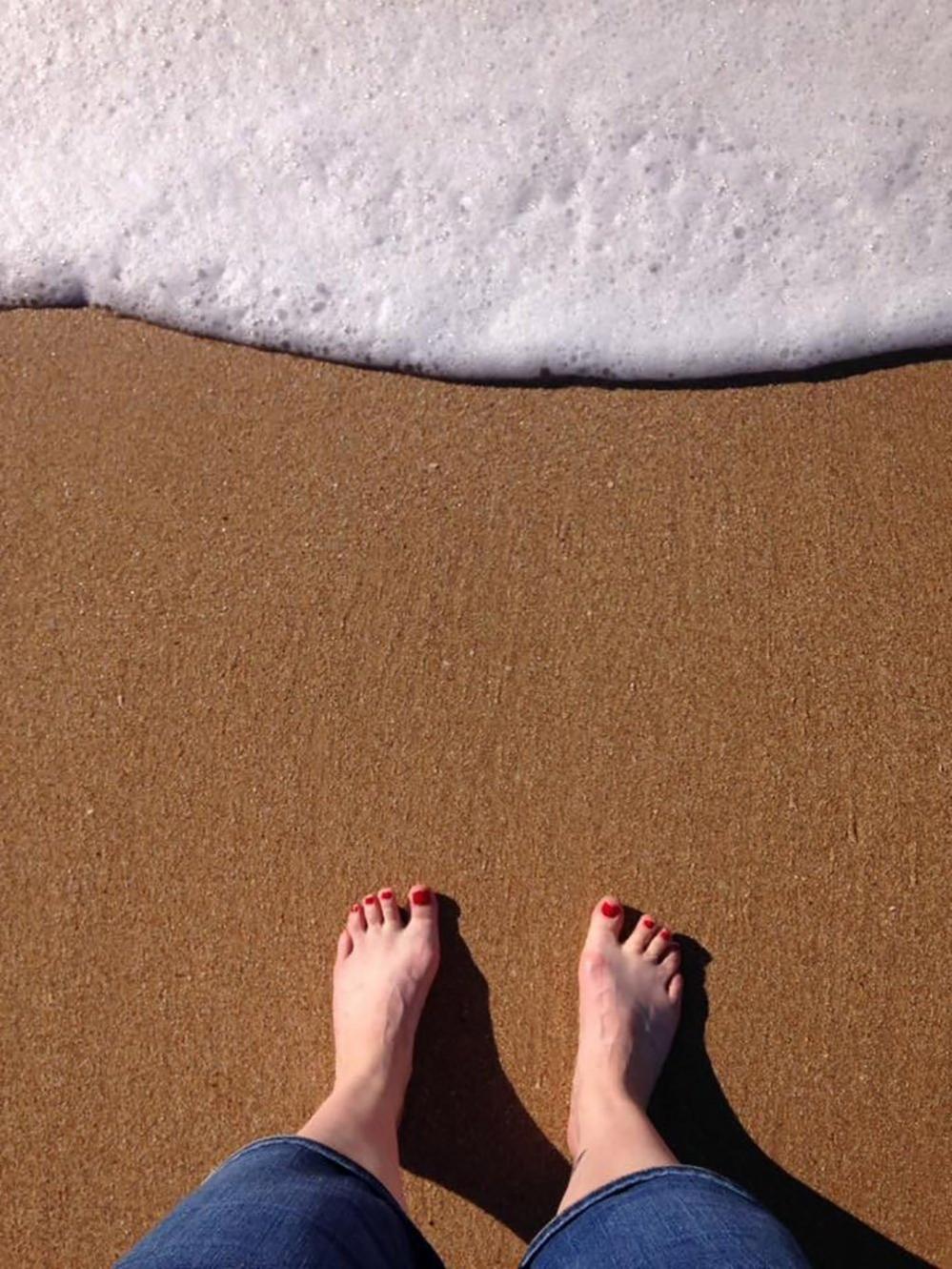 Feet on a beach