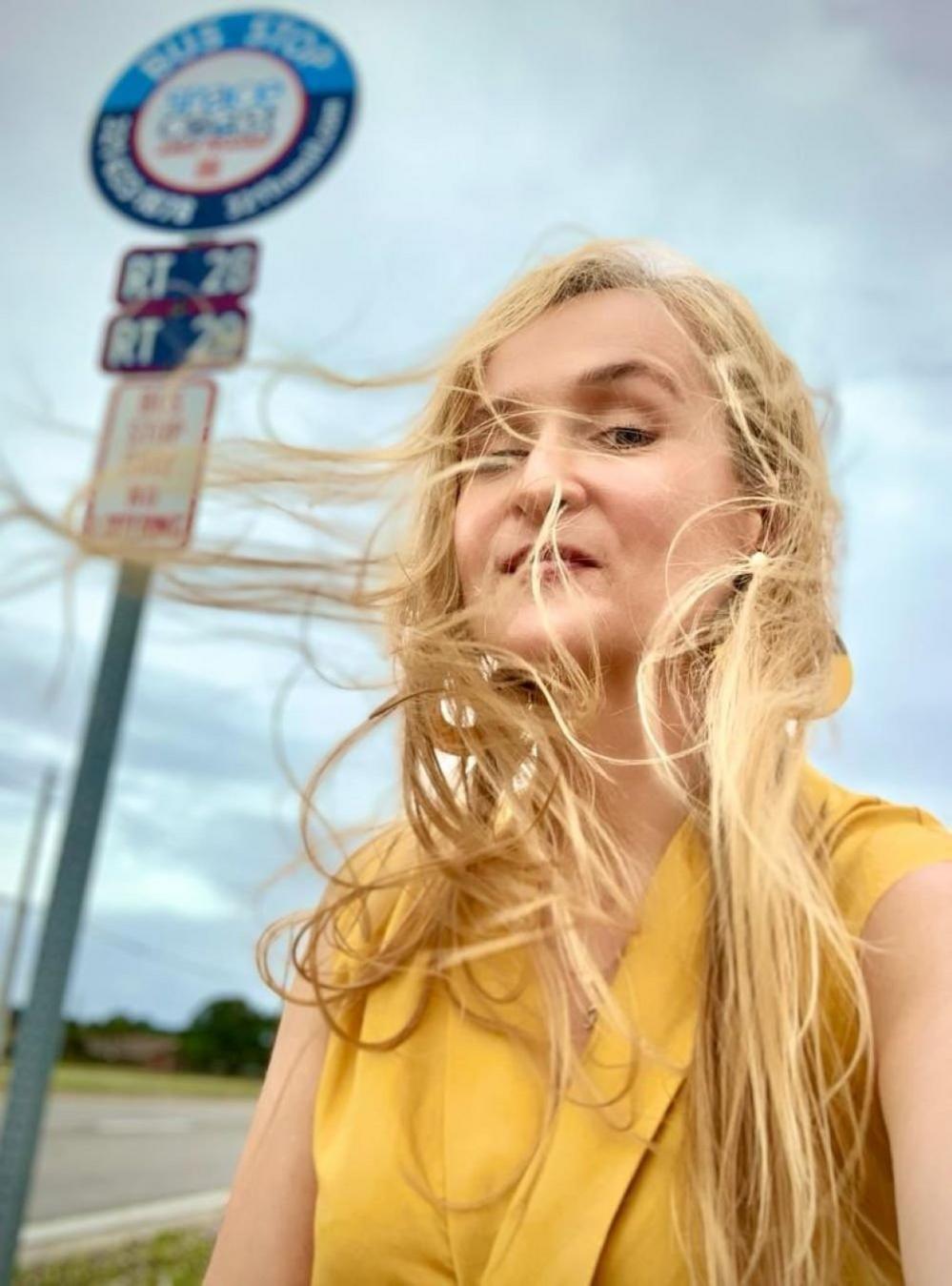 Woman at a bus stop