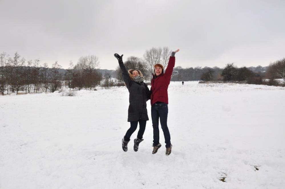 Two women jumping