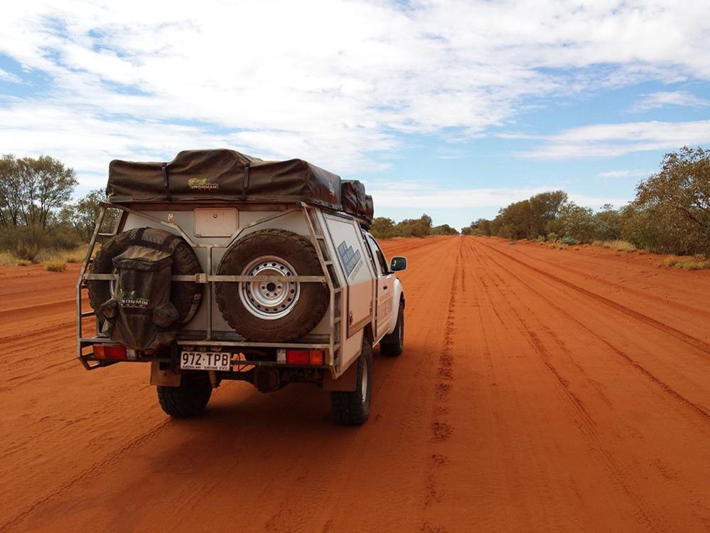 Car on a dusty road